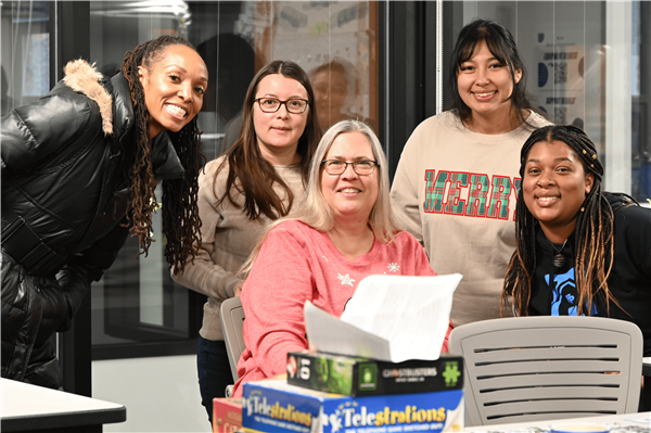 Staff members posing for a picture